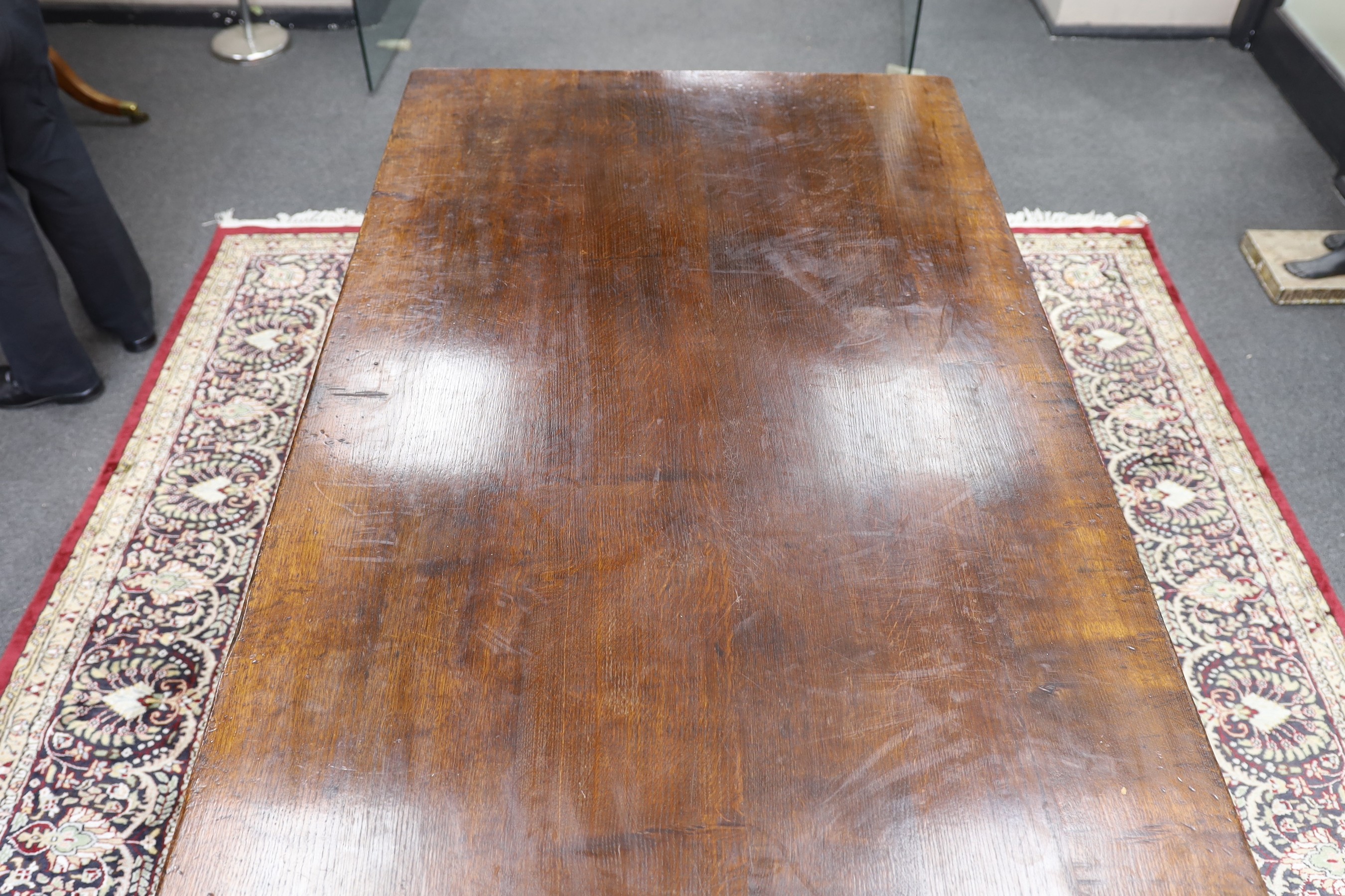 A Titchmarsh and Godwin rectangular oak refectory dining table, length 213cm, width 90cm, height 78cm